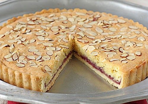 a pie that has been cut in half and is sitting on a pan with one slice missing