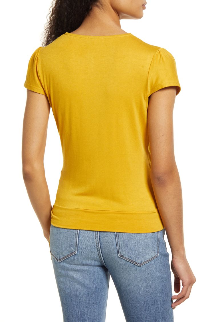 A faux-wrap front flatters on this soft and versatile jersey top cinched with a saucy tie at the hip. 23 1/2" length Surplice V-neck Short sleeves 95% rayon, 5% spandex Machine wash, dry flat Imported Women's Clothing Stretch Rayon V-neck Top, Fitted V-neck Rayon Top, Chic Modal V-neck Tops, Chic V-neck Modal Tops, Versatile V-neck Ruched Tops, Spring Ruched Viscose Tops, Fitted Solid Color Top With Twist Front, Stretch V-neck Twist Front Top, Stretch V-neck Top With Twist Front