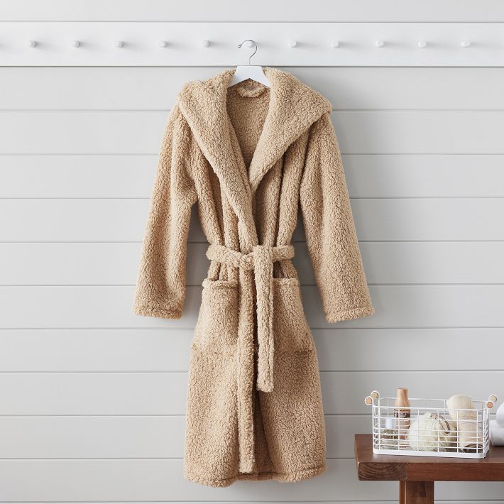 Get cozy after a warm bath or shower with this super-soft Sherpa robe. Full of style and comfort, this solid layer will make you feel like you're having an instant spa day. Plus, it's made entirely from recycled materials. KEY PRODUCT POINTS OEKO-TEX(R) STANDARD 100: tested for 1000+ harmful substances to keep you and your family safe from chemicals common to textile manufacturing. 14.HUS.42449 HOHENSTEIN HTTI. Made of 100% recycled polyester. Designed with a plush hood, 2 roomy pockets, sash be Cozy Relaxed Fit Robe For Loungewear, Cozy Robe With Relaxed Fit For Loungewear, Cozy Beige Sleepwear For Winter, Cozy Relaxed Fit Robe For Lounging, Cozy Super Soft Long-sleeved Robe, Super Soft Cozy Robe With Long Sleeves, Cozy Sleep Robe For Fall, Cozy Long-sleeve Super Soft Robe, Cozy Fall Sleep Robe