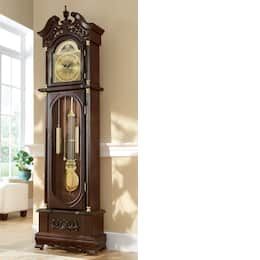 a grandfather clock in the corner of a living room with beige walls and flooring