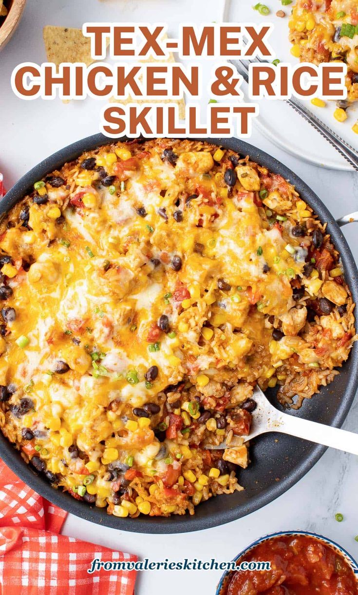 tex - mex chicken and rice skillet in a cast iron skillet