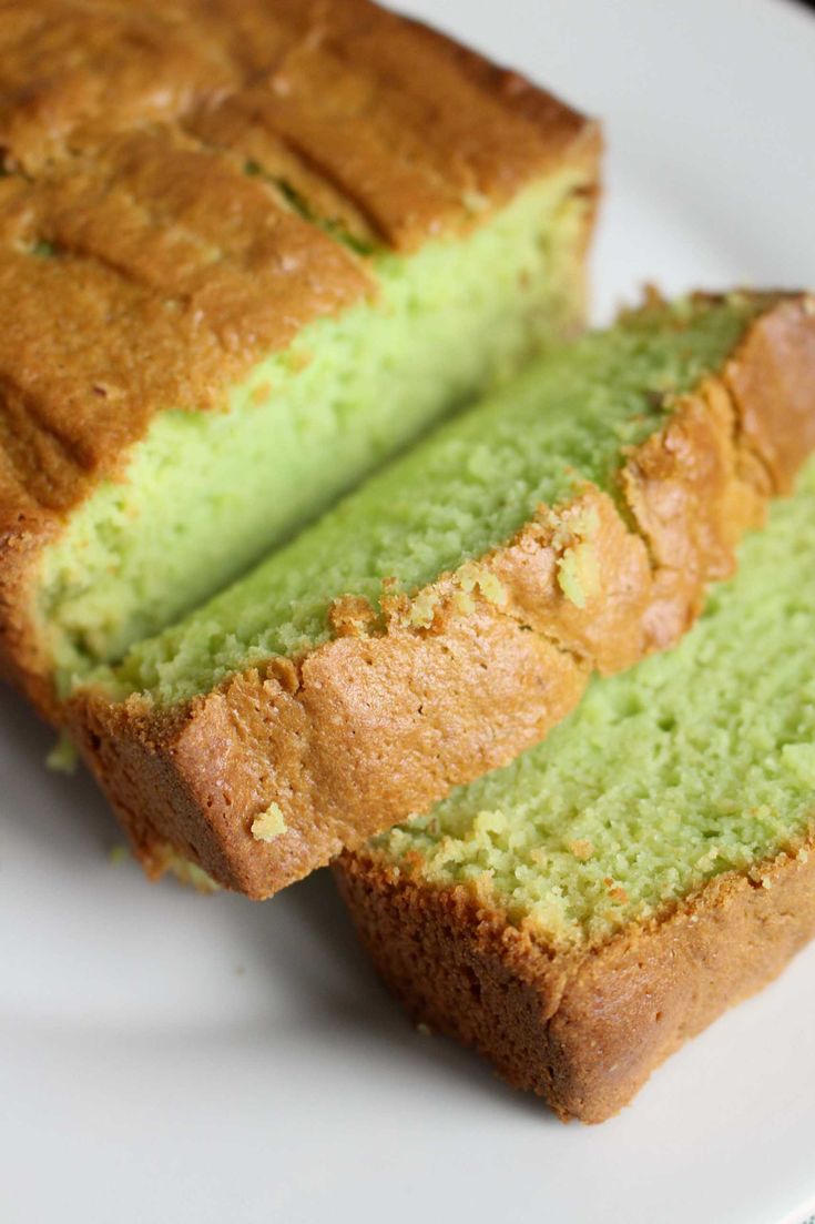 a piece of green cake on a white plate