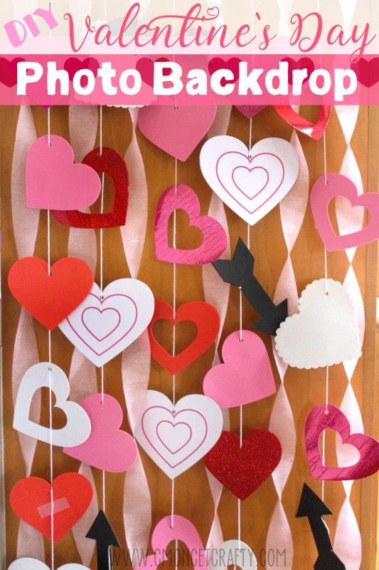 valentine's day photo backdrop with paper hearts