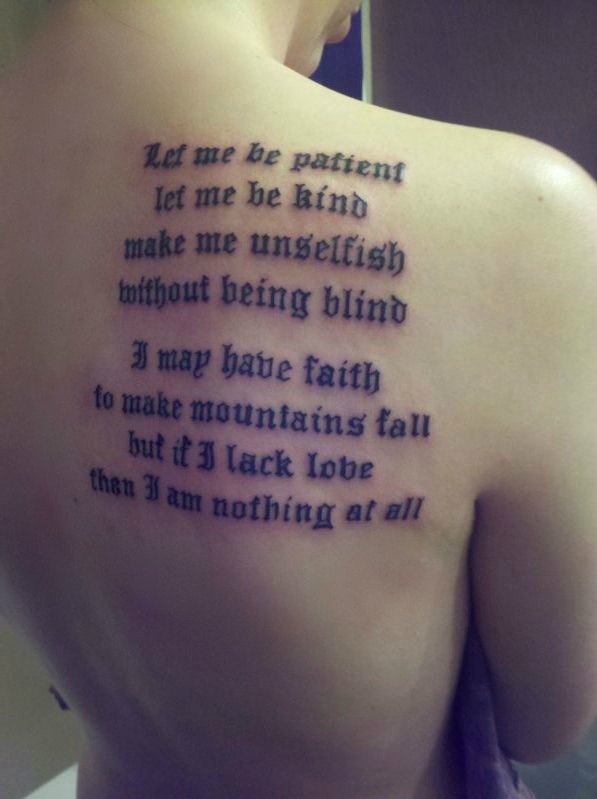 a woman with a tattoo on her back that reads, let me be patient let me be left to make me unselicify without being blind