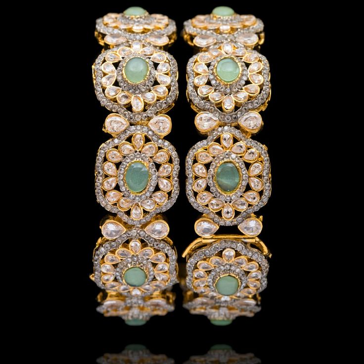 Indulge in the allure of this exquisite pair and let contemporary grace redefine your fashion narrative! Crafted with sparkling zircons and complemented by the refreshing allure of mint green stones, elevate your style with the perfect harmony of sophistication and playfulness. Kindly note that these bangles are openable for easy wearing. Gold-plated on high-quality brass as base metal. Made by order. Kindly allow 5-7 weeks for the delivery of this item. For custom or urgent requests, please contact support@alacouture.com. *Please Note: We use faux stones and beads in all of our jewelry. Heritage Jewellery, Green Stones, Perfect Harmony, Waist Chain, Faux Stone, Head Accessories, Last Call, Green Stone, Base Metal