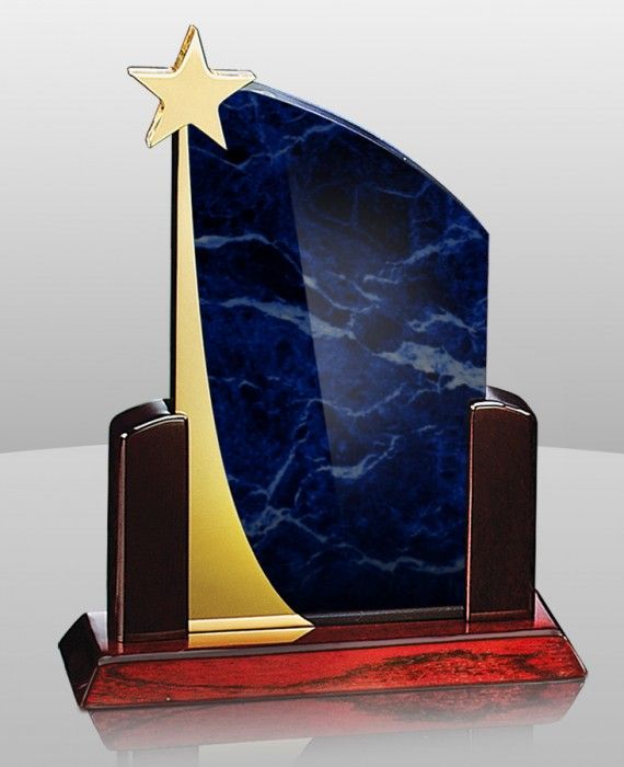 a blue marble trophy with a gold star on it's top and a wooden base