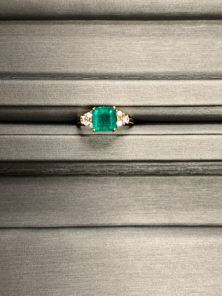 Metal: 14 karat yellow gold Main Stone: Natural Fine Emerald 1.80 carat Square Emerald Faceted Origin, Columbia Side Stones: 6 Natural Diamonds .25 carat GH/VS Size: 5.5, Can be Resized by most jewelers with a LASER Welder only. (contact your local jeweler) Vintage: 90s Great Mother's Day gift idea for the mom who loves jewelry and has it all Laser Welder, Diamond Rings With Price, Emerald And Diamond Ring, Circle Diamond, Multi Stone Ring, Wide Bands, Moissanite Engagement Ring, Moissanite Engagement, Gold Style