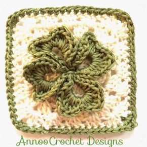 a crocheted square with a four - leaf clover on the center, and text overlay that says anno crochet designs