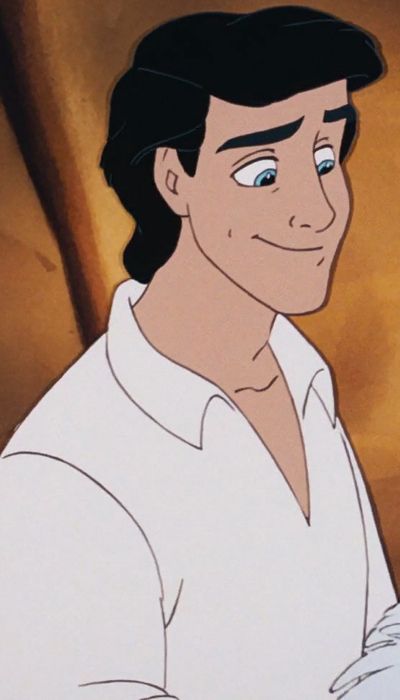 an animated image of a man with blue eyes and black hair wearing a white shirt