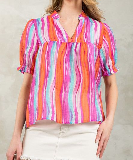 This bright and cheerful top features a wave stripe pattern, v-neckline and short sleeves. The perfect pop of color for summer, this top can be styled for work or play. 75% Tencel, 20% nylon, 5% linen Model is wearing a size small and is 5'9" FINAL SALE - CANNOT BE RETURNED OR EXCHANGED Round Top Collection, Patriotic Dresses, Athleisure Leggings, Patriotic Fashion, Maxi Dress Navy, Stripe Top, Sleeveless Maxi Dress, Lingerie Sleepwear, Striped Shorts