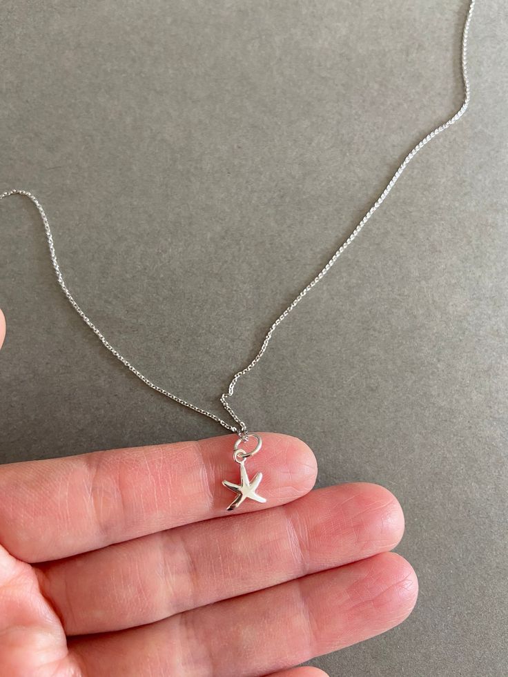 Silver Tiny Mini Starfish Necklace - Sterling Silver  [NS1004] ★ Quantity: One  ★ Color : Silver  ★ Materials : Sterling Silver ★ Size : Starfish : 8mm ★ Chain Length : 16 inches  ★ Suitable for delicate and sensitive skin. ★ Comes in a jewelry box. If you need extra boxes for gifting....just let us know! Silver Jewlery, Starfish Necklace, Funky Jewelry, Jewelry Lookbook, Silver Prices, Silver Material, Jewelry Inspo, Dream Jewelry, Necklace Sterling Silver