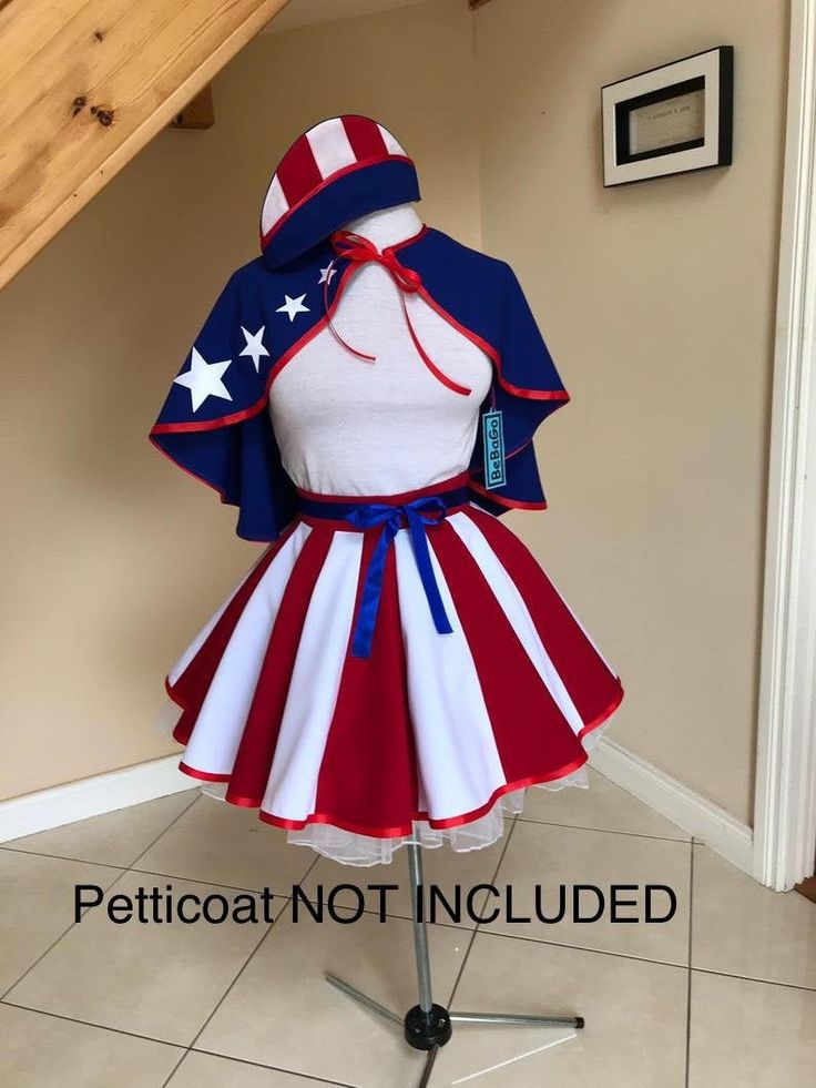 a red, white and blue dress on a mannequin with the words petticoat not included