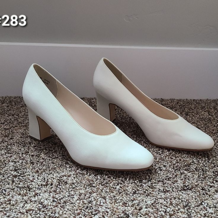 Ivory Pumps. 2.5" Chunky Heels. Rounded Toe. Coloriffics Brand. New Condition. Slight Flaw As Pictured. Formal Cream Court Shoes With 4-inch Heel, Classic White Heels With Medium Width, Cream Court Shoes With Sculpted Low Heel, Fitted Cream Court Shoes With Sculpted Heel, Spring White Medium Width Court Shoes, Cream Heels For Formal Occasions, Cream Heels Fitted For Formal Occasions, Cream Fitted Heels For Formal Occasions, Fitted Cream Heels For Formal Occasions