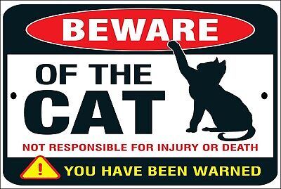 beware of the cat sign is shown here