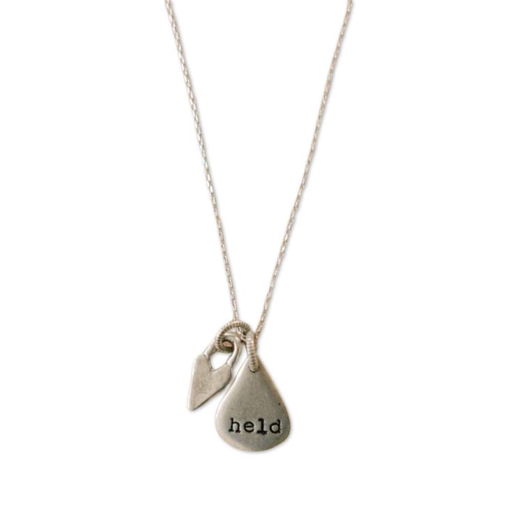 Short and sweet. We’ve paired a mini pendant with a becoming charm, both suspended on an elegant, dainty chain. Each piece is customized uniquely to you, with a hand-stamped word and tag that has been prayed over. As well as a charm selected that best represents what we believe God is showing us about you or your loved one! This dainty duo is sure to be an everyday encouragement. This piece includes a personalized card explaining what we heard for you. The encouragement is free, and your keepsak Jewel Logo, Believe God, Silver Shorts, Words Of Hope, Short And Sweet, Dainty Chain, Encouragement Cards, Custom Necklace, Personalized Card