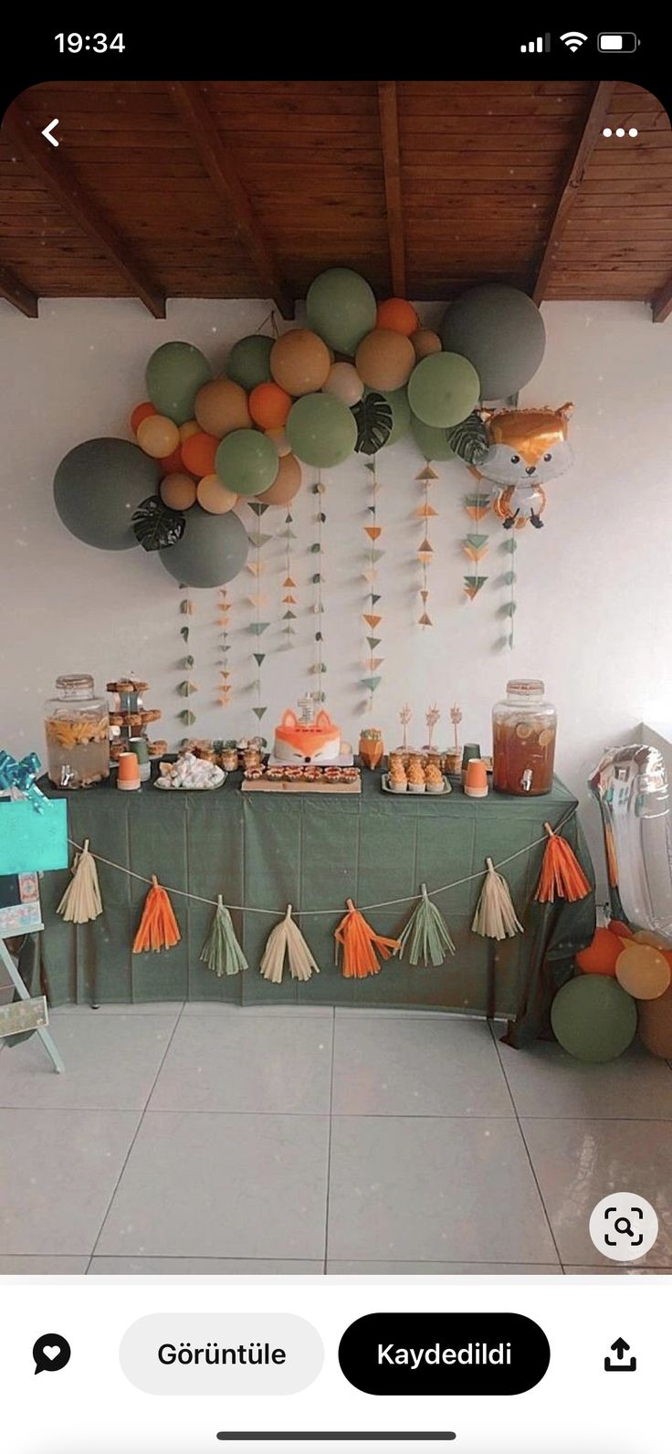 an image of a party with balloons and decorations