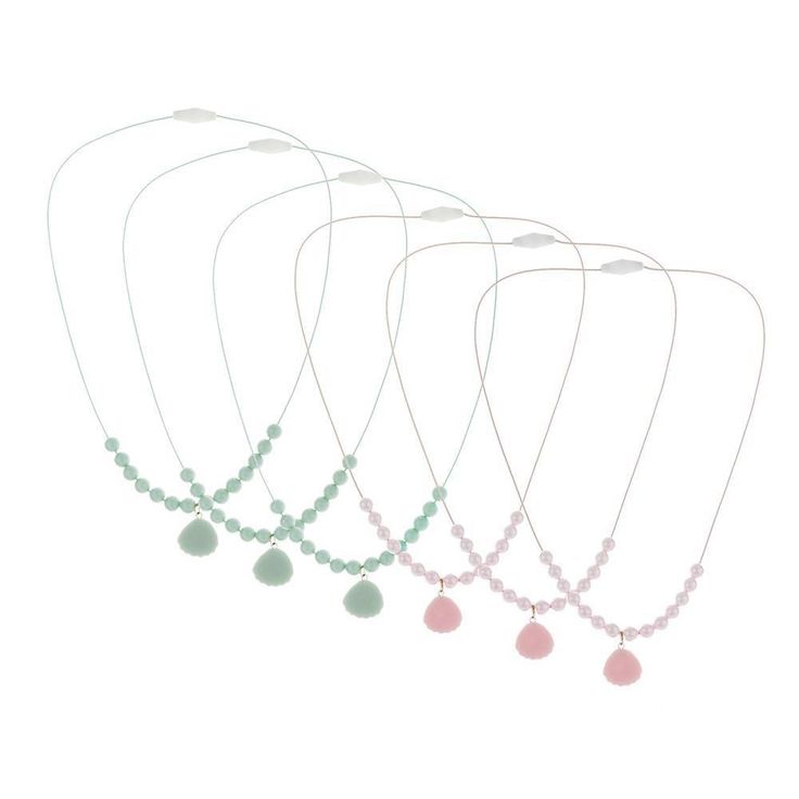 This 6-Count of Shell Necklaces from Spritz™ makes both a fun party favor and a great addition to summery outfits. Made from acrylic, these necklaces feature a row of beads along the bottom with an attached seashell charm. The set includes 3 light green and 3 pink necklaces to give you two color options. Pack them in bags as party favors, or try using one to accent a unique beachside outfit. Playful Adjustable Necklace For Birthday, Cute Adjustable Hypoallergenic Necklace, Cute Adjustable Beach Necklaces, Adjustable Hypoallergenic Necklace For Birthday, Playful Adjustable Necklaces For The Beach, Playful Adjustable Necklace With Lobster Clasp, Cheap Shell-shaped Necklace For Gift, Playful Pink Necklaces For Beach, Playful Pink Necklace For Beach