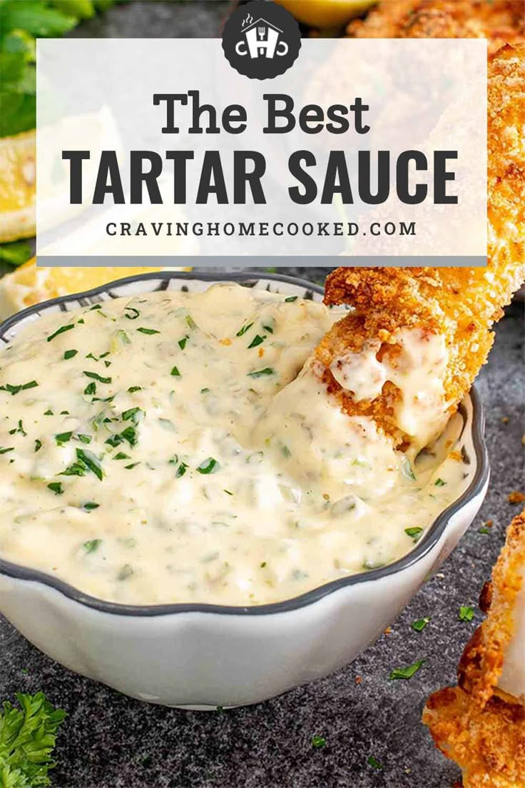 the best tartar sauce is served in a white bowl and garnished with parsley