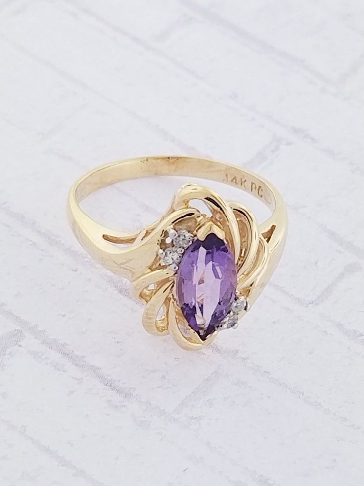 Marquise Diamond Birthstone Ring, Elegant Purple Marquise Cut Amethyst Ring, Elegant Marquise Cut Amethyst Jewelry, Elegant Purple Amethyst Ring With Marquise Cut, Fine Jewelry Birthstone Ring With Diamond Accents, Marquise Cut, Marquise Diamond Birthstone Ring With Gemstone, Elegant Marquise Cut Amethyst Ring, Purple Marquise Jewelry For Formal Occasions, Formal Marquise Birthstone Ring