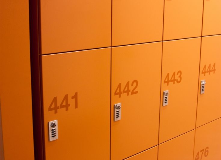 an orange locker with numbers on it and the number 544 in front of them