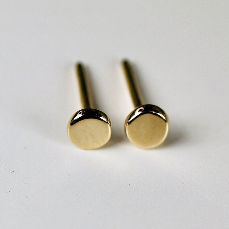 14k gold minimalist stud earrings. Round shape, circle delicate studs. These sweet little circle earrings are post/stud style and included silicon backings. You can choose 14k earrings backing from drop down menu. Circles are approximately 1/8" inch (3mm) diameter. You can purchase single or pair and with push back post and backings or screw post and backings. Please choose from drop down menu. * All our raw materials are sourced from US-based companies for the quality and safety of our handmade Minimalist Rounded Earrings For Gift, Minimalist Rounded Earrings For Gifts, Minimalist Rose Gold Circle Earrings, Minimalist Rose Gold Round Earrings, Minimalist Yellow Gold Round Cartilage Earrings, Minimalist Round 14k Gold Cartilage Earrings, Minimalist 14k Gold Round Earrings, Minimalist Tarnish-resistant Round Cartilage Earrings, Tiny Rose Gold Round Earrings