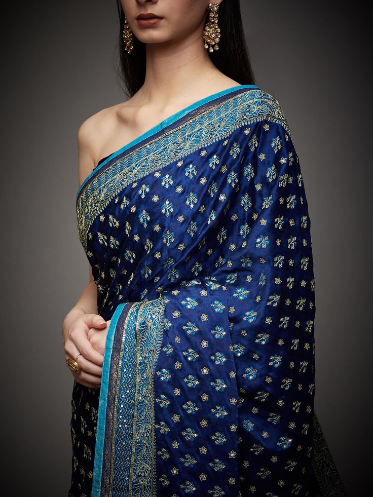 Editor's Note Embrace royal elegance with our royal/turquoise ari with tikki-h embroidered parampara ari 60 kasab sari, complete with an unstitched blouse. This ensemble is the epitome of traditional opulence, perfect for special occasions and events where you want to make a regal and sophisticated statement. The intricate embroidery and rich color combination ensure you stand out and leave a lasting impression. With the convenience of an unstitched blouse, you can customize your look to your li Royal Blue Color Combinations, Satin Sari, Royal Blue Saree, Blue Color Combinations, Blue Saree, Dress Inspo, Satin Color, Intricate Embroidery, Royal Blue Color