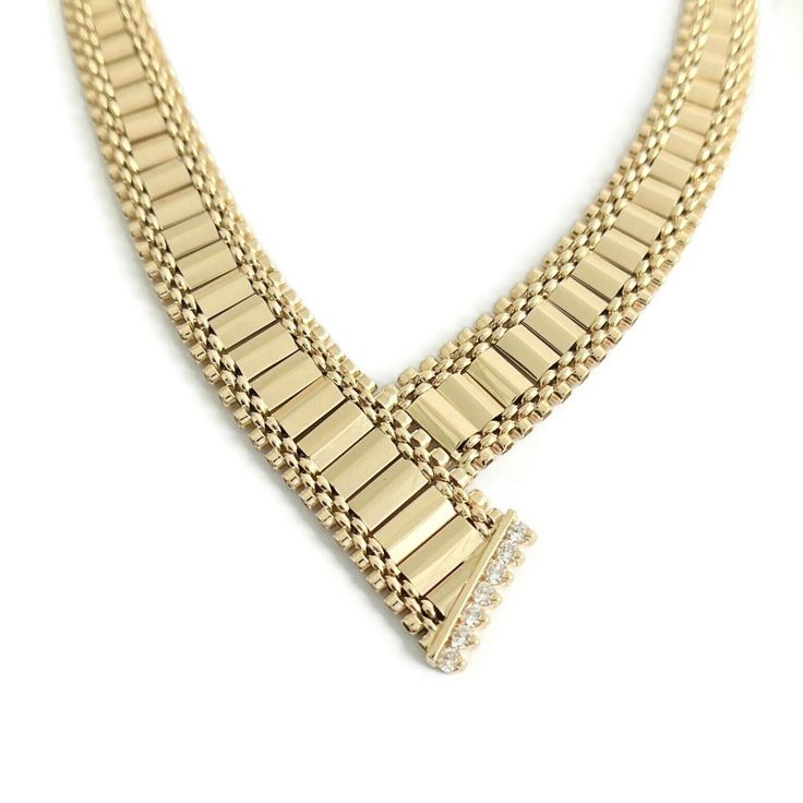 Vintage Diamond Fancy Link Chevron Necklace 14K Yellow Gold 28.50 Gr This is a beautiful necklace. Please let us know if you have any questions :) Diamonds: 7 round brilliant cuts .22 ctw, G, SI1 Metal: 14K yellow gold Weight: 35.73 grams Stamped: NA (x-ray tested) Length: 16.5 inches Width: 8.5 mm - 16.4 mm Clasp: snap with safety latch Formal Baguette Diamond Necklaces, Formal Gold Diamond Necklace With Polished Finish, Gold Diamond Necklace With Polished Finish For Formal Occasions, Gold Necklaces With Baguette Diamonds, Formal Gold Diamond Necklace With Baguette Diamonds, Elegant Gold Necklace With Baguette Diamonds, Elegant Gold Necklaces With Baguette Diamonds, Formal 14k Gold Necklace With Baguette Diamonds, Classic Gold Diamond Bridal Necklace