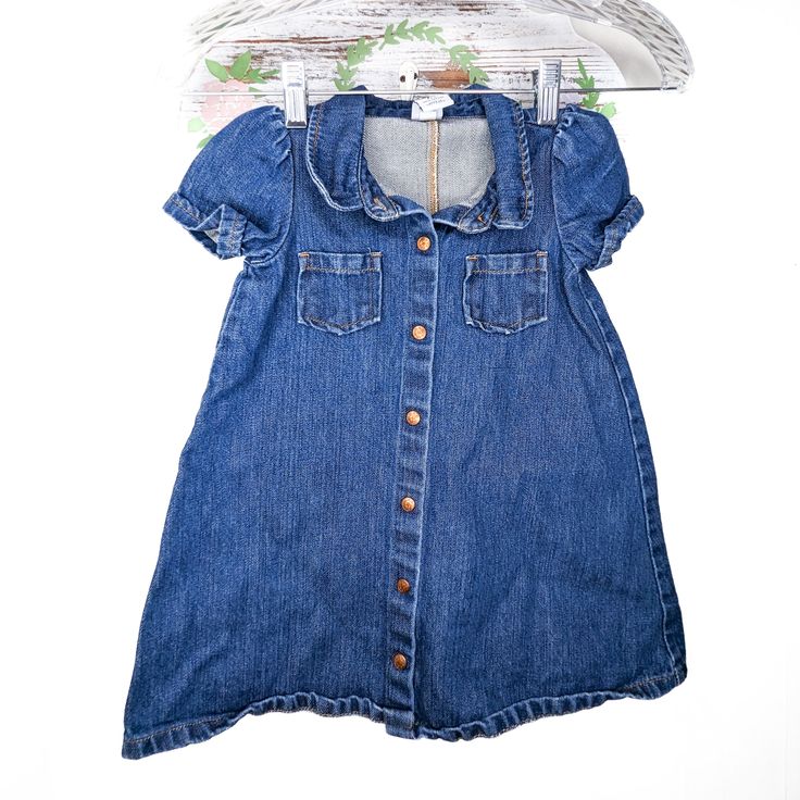 Crafted with love and attention to detail, this dress captures the essence of classic denim fashion. Made of 100% cotton, it ensures both comfort and durability, perfect for your little one's active adventures. The blue jean denim fabric exudes a timeless appeal, while the brass buttons add a touch of vintage charm. The front button closure not only adds visual interest but also allows for easy dressing, making it a practical choice for busy parents. Designed for size 3 years, this dress provides a perfect fit for your growing baby girl. Its classic design and A-line silhouette create a charming and versatile piece that can be dressed up or down for any occasion. Made with quality craftsmanship and timeless style, this vintage denim baby girl's dress is a true treasure. It embodies the nos Denim Baby, Brass Buttons, Busy Parents, Easy Dressing, Toddler Clothes, Blue Jean, Clothes Accessories, Vintage Baby