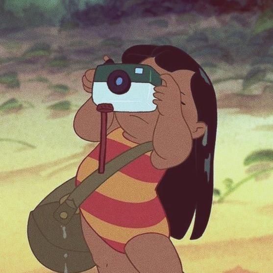 a cartoon character taking a picture with a camera