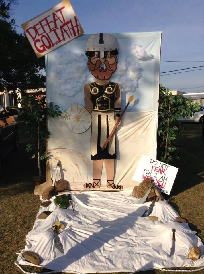 a large poster with a man in uniform on it's side and other items surrounding it