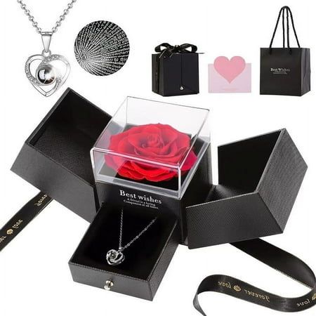 an open box with a rose in it and other items surrounding it on a white background