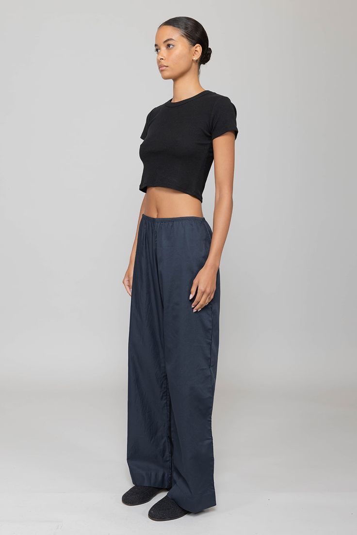 Cut in our anything but basic Kelly Cotton Rib, The Kelly Crop Slim Fit Tee is the perfect high waist pant companion. Featuring a crew neckline, a just right cropped length, and clean, tailored finishing. Casual Stretch Bottoms With Cropped Hem, Everyday Cropped Cotton Bottoms, Cotton Crop Top With Elastic Waistband, Versatile Cropped Workwear Bottoms, Versatile Relaxed Fit Crop Top For Loungewear, Versatile Cropped Bottoms For Loungewear, Versatile Stretch Cropped Pants, Versatile Cropped Relaxed Fit Pants, Versatile Cropped Pants With Relaxed Fit