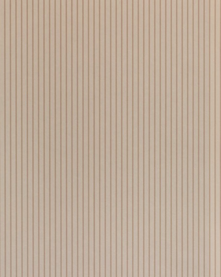 an image of a white wall with vertical lines on it's sides and the bottom part of the wall painted beige