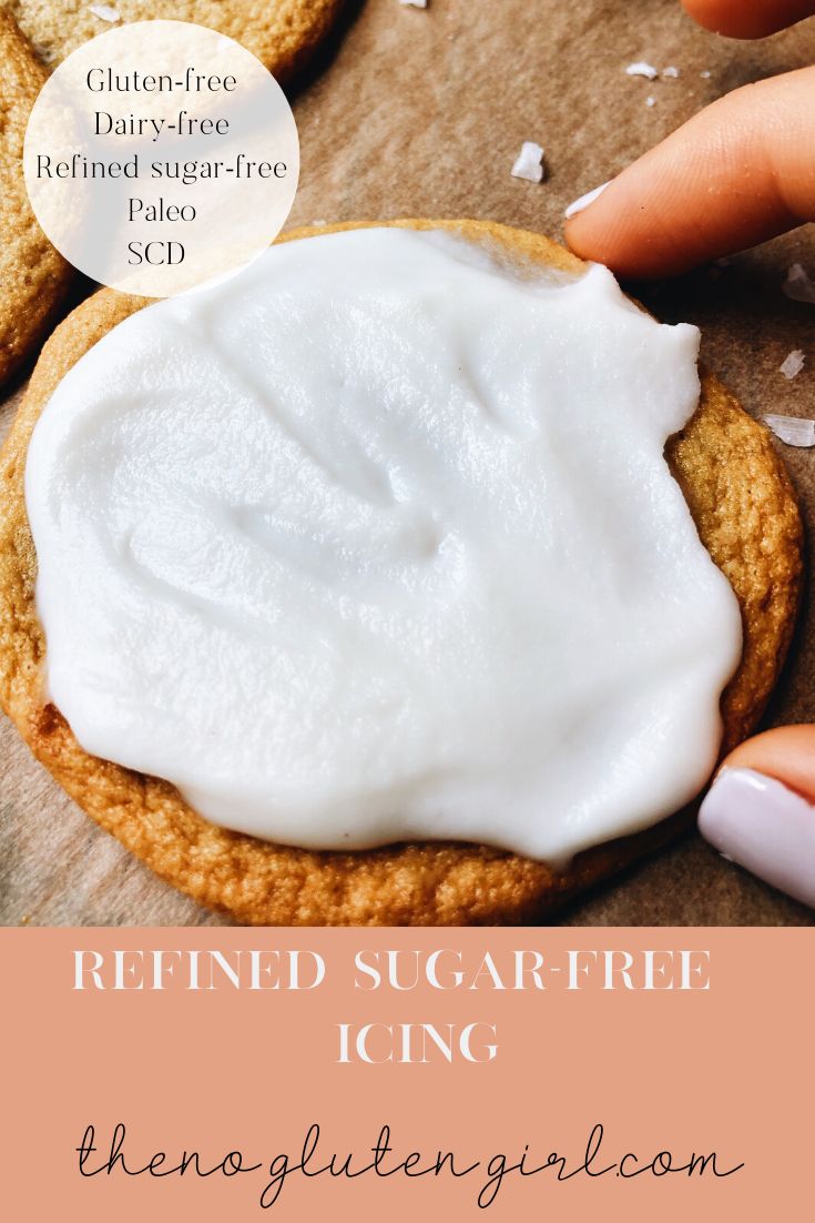 a close up of a cookie with icing on it and the words refried sugar - free icing