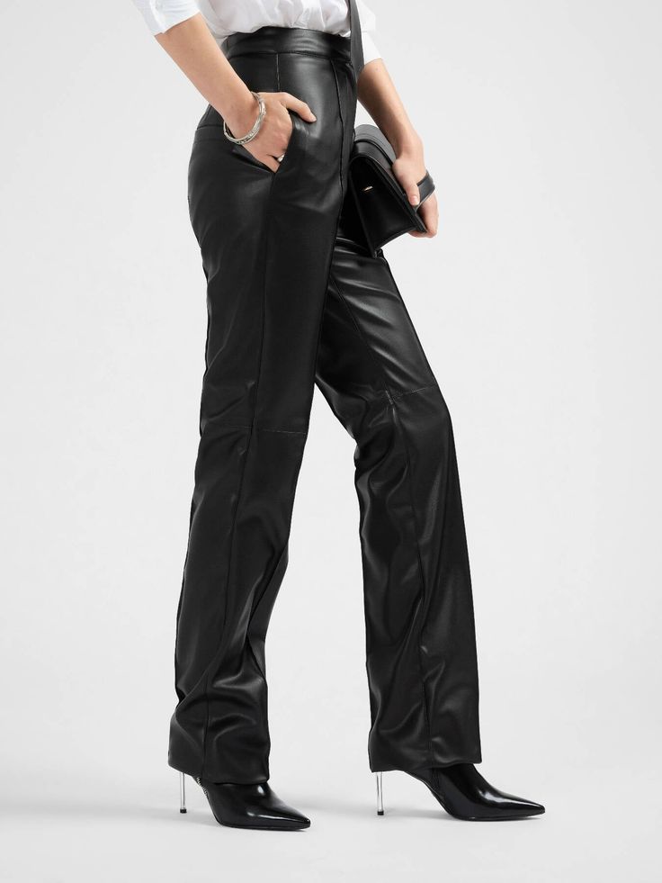 HANNAH Vegan Leather Straight Leg Trousers Vegan leather trousers Zipper fly front closure High-waisted Side pockets Straight leg fit Partially lined Our model is 178cm tall and is wearing size XSComposition: Exterior: 50% Polyurethane 50% Polyester / Lining: 100% ViscoseCare information Machine wash max. 30°C, delicate Do not bleach Do not tumble dry Ironing at max. 100°C Dry clean any solvent except trichloroethylene SIZE GUIDE This table offers an approximate conversion of the size you find o Straight Trousers, Leather Trousers, Straight Leg Trousers, Body Measurements, Vegan Leather, Leather Pants, Straight Leg, Trousers, High Waisted