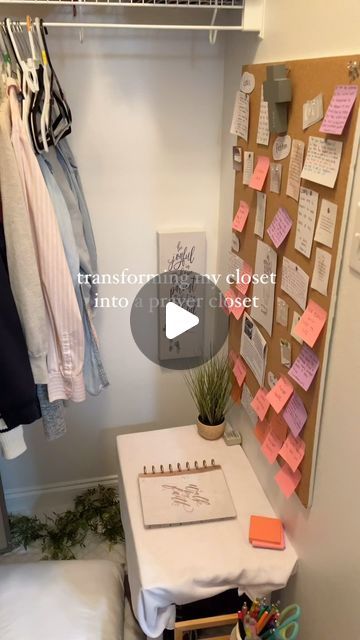 a closet with clothes and notes on the wall