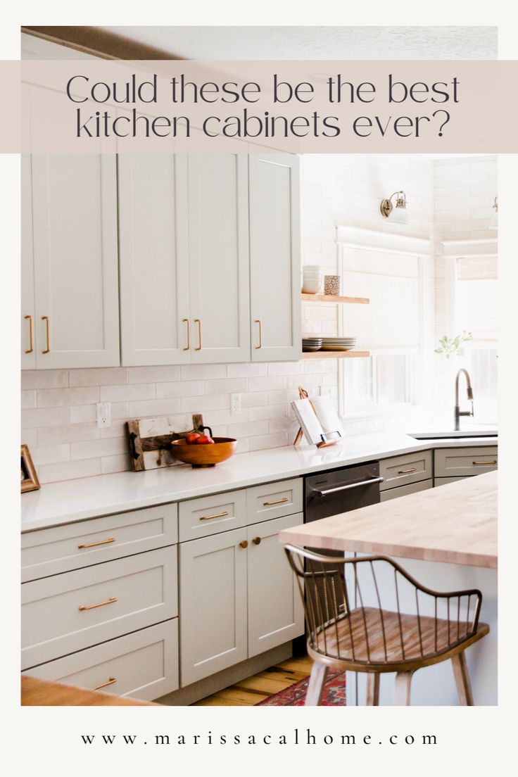 the kitchen cabinets are all white and have gold trimmings on them, with text overlay that reads could these be the best kitchen cabinets ever?