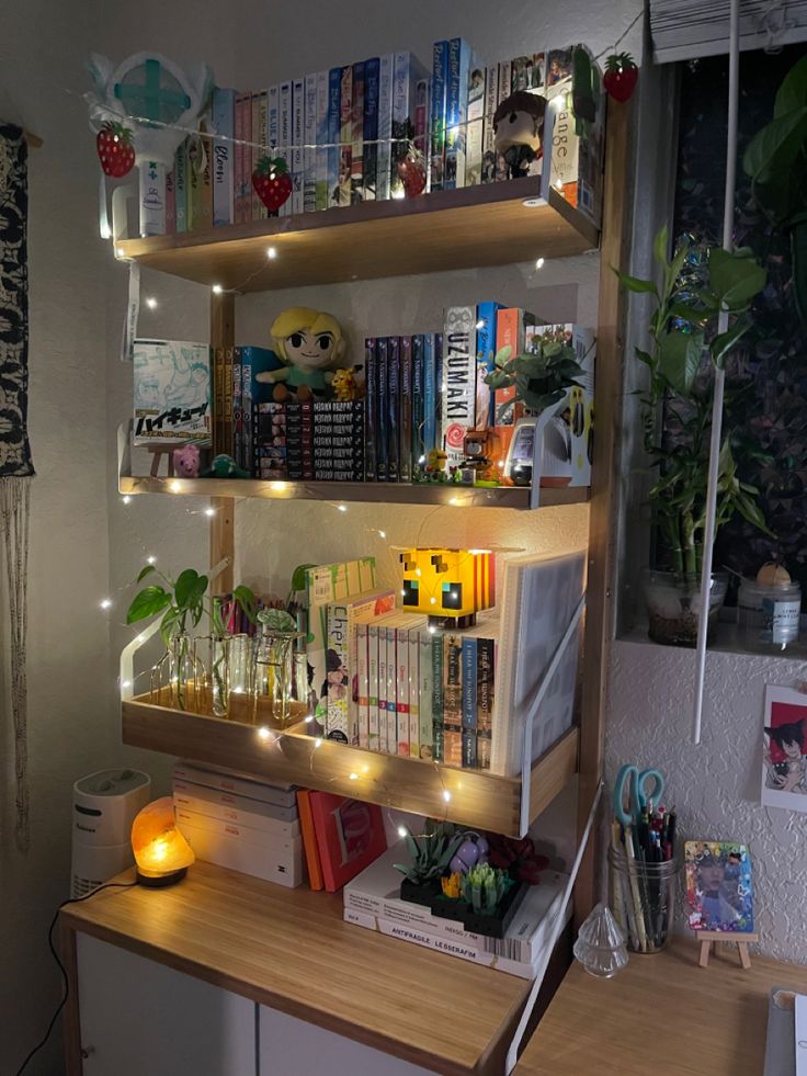 the shelves are filled with books, plants and other things on display in this room