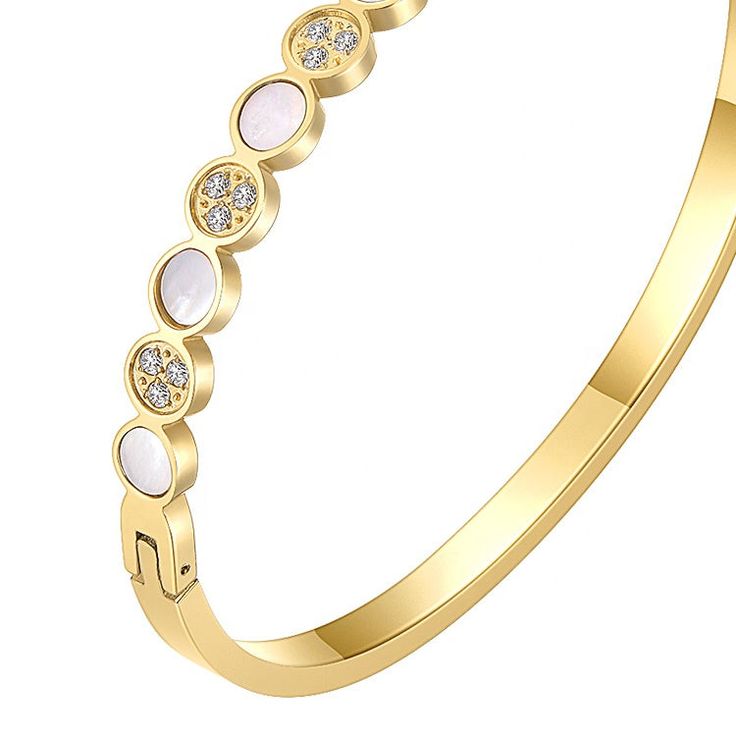 Introducing the Melinda bracelet, a stunning and eye-catching piece of jewelry that will add a touch of glamour to any outfit. Crafted with exquisite attention to detail, this bracelet features 18k gold plating that exudes luxury and elegance. Not only is the Melinda bracelet beautiful, but it's also built to last. Thanks to its water and tarnish-resistant design, this bracelet can withstand everyday wear and tear, ensuring that it will stay looking its best for years to come. But what really se Gold Plated Bracelets For Party, Gold-tone Jubilee Bracelet For Wedding, Gold-tone Jubilee Bracelets For Wedding, Gold Plated Cubic Zirconia Bracelets, Elegant Gold Crystal Bracelet, Gold Cubic Zirconia Bangle Bracelet, Elegant Rose Gold Plated Bracelets, Elegant Rose Gold-plated Bracelets, Gold Jubilee Crystal Bracelet