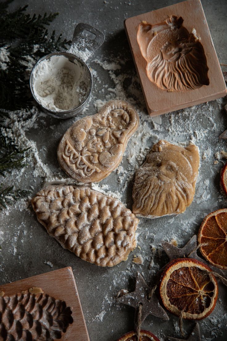 some cookies and orange slices on a table