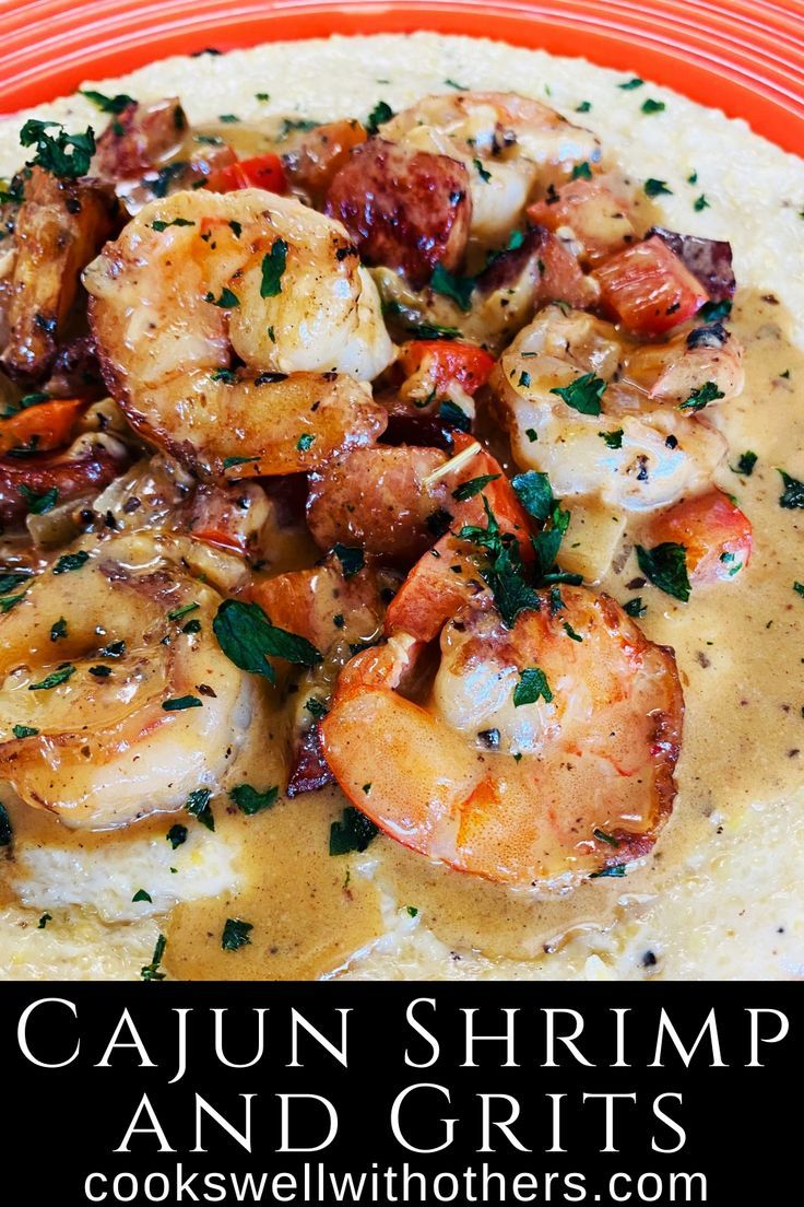 shrimp and grits on a plate with cream sauce Shrimp And Grits Recipe New Orleans, Best Shrimp And Grits Recipe, Creamy Cheesy Grits, Shrimp And Andouille Sausage, Easy Shrimp And Grits, Southern Shrimp And Grits, Shrimp Grits Recipe, Andouille Sausage Recipes, Cajun Cream Sauce