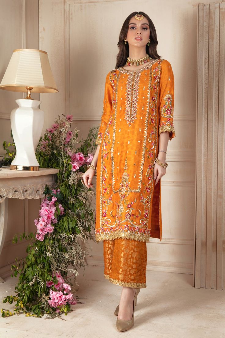 Pariza | Pakistani Designer Outfit | Sarosh Salman Yellow Raw Silk Palazzo Set With Dabka Work, Gold Tissue Silk Palazzo Set With Resham Embroidery, Semi-stitched Orange Palazzo Set With Gota Work, Gold Palazzo Set In Raw Silk With Mirror Work, Gold Palazzo Set With Mirror Work In Raw Silk, Orange Palazzo Set With Straight Kurta For Designer Wear, Orange Straight Kurta Palazzo Set For Designer Wear, Gold Palazzo Set With Dabka Work In Tissue Silk, Bollywood Style Orange Palazzo Set With Straight Kurta