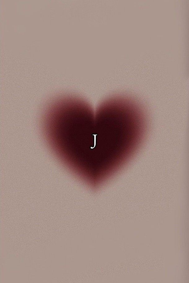 a heart shaped object with the letter j on it