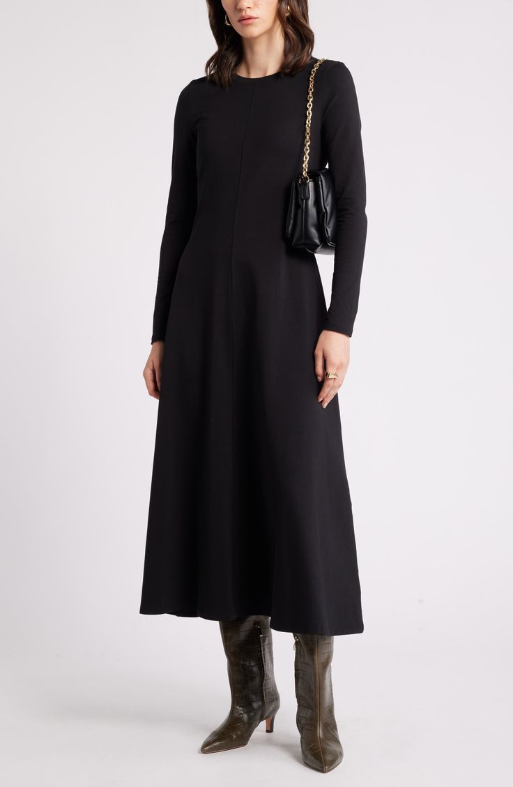 Keep your casual style effortless in this stretch-jersey maxi dress updated with long sleeves and a seam down the middle. 50 1/2" length (size Medium) Slips on over head Crewneck Long sleeves Unlined 93% cotton, 7% spandex Machine wash, tumble dry Imported Fall Maxi Dress With Stretch, Sleek Long Sleeve Maxi Dress, Fall Long Sleeve Midi Dress With Flattering Silhouette, Fall Midi Dress With Flattering Silhouette And Long Sleeves, Black Long Sleeve Elastane Midi Dress, Sleek Black Long Sleeve Maxi Dress, Long Sleeve Maxi Dress For Fall Workwear, Chic Long Sleeve Maxi Dress With Flattering Silhouette, Fall Midi Dress In Elastane