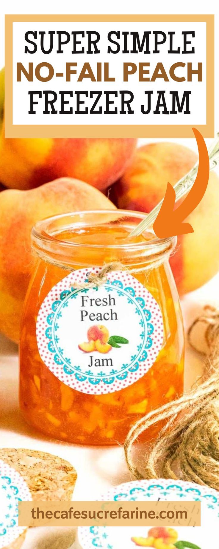 a jar filled with peach jam sitting on top of a table