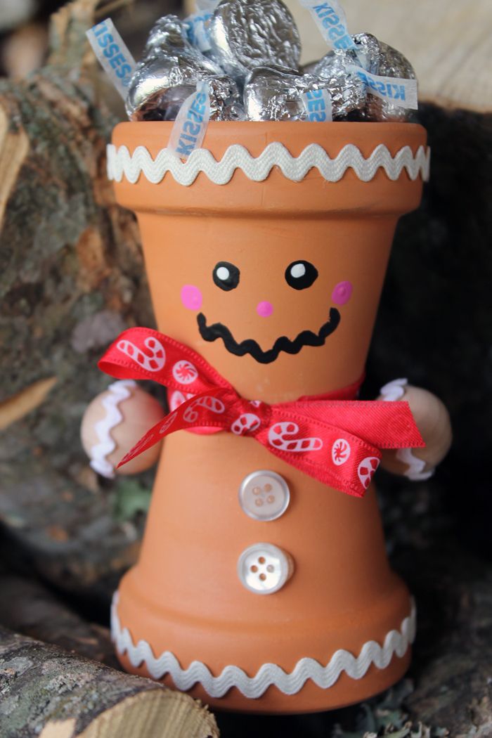 a clay pot that has some candy in it