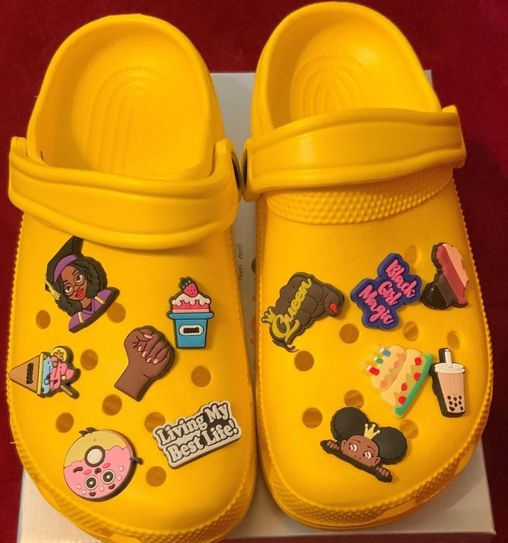 These crocs are filled with charms that reflect Black girl magic! They are handmade therefore no 2 pair are the same.  *PLEASE NOTE* The shoes you receive may not be exactly as pictured but they will be similar! Croc Ideas, Yellow Crocs, Croc Charms, Platform Slippers, Crocs Shoes, Black People, No. 2, Shoe Accessories, Slippers