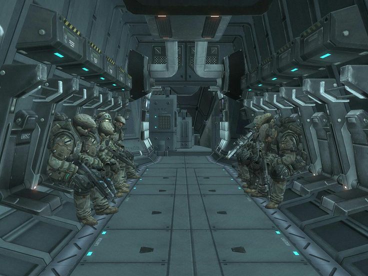 some soldiers are in a sci - fi space station