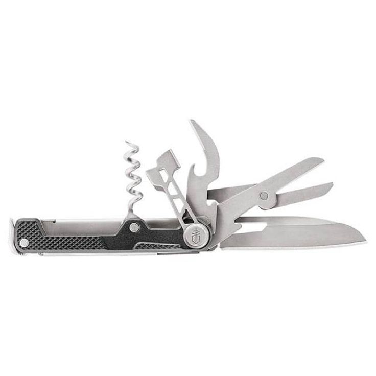 an open swiss army knife with multiple blades and tools attached to the blade, on a white background