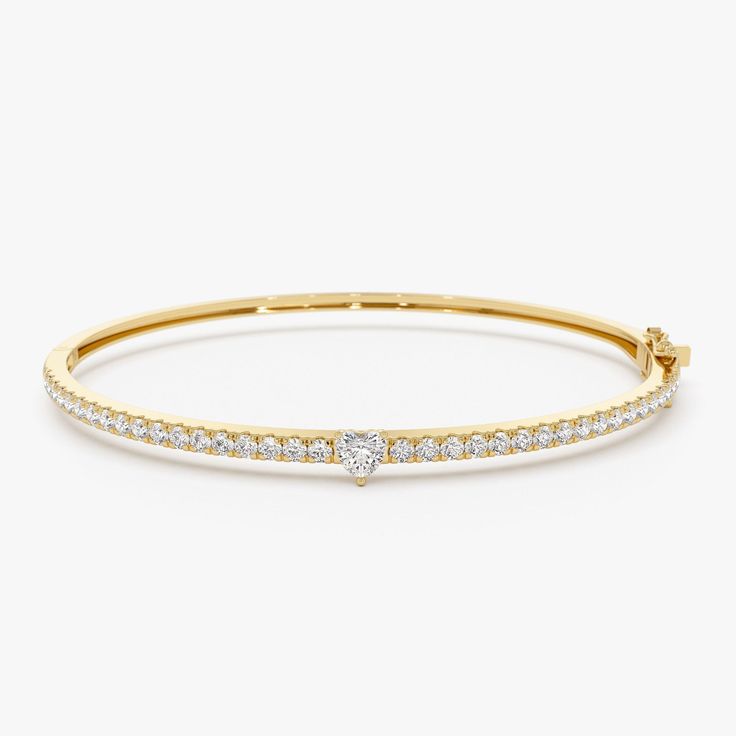 14K Diamond Bangle Bracelet with Heart Detail: This luxurious gold bangle features shimmering round pave diamonds and a sentimental heart accent. Perfect for stacking, it's a blend of elegance and charm, ideal for special occasions or daily sparkle * Made to Order * Gold KT: 14K Solid Gold (also available in 18K  upon request) * Custom Gold Color: Rose Gold, Yellow Gold, White Gold * Width: 3.75 MM * Round Diamonds: 36 pcs 1.75 MM * Heart Shaped Diamond: 1 pc 4 MM * Total CTW: 1.10 Ctw * Diamond Color Clarity: G Color SI Clarity * Ready to Ship in 7-10 Business Days ▶ See more of our Diamond Bracelets - http://etsy.me/2mVrAB5 ▶ See our storefront here - http://etsy.me/2lUcVnH  ▶ All store sections here * Diamond Rings - http://etsy.me/2lwKUl8 * Diamond Earrings - http://etsy.me/2lyqVBP * D Luxury Diamond Heart Bracelet With Accents, Diamond Heart Bracelet With Accents, Diamond Heart Bracelet With Diamond Accents, Heart Shaped Diamond Bracelet With Accents, Fine Jewelry Pave Setting Bracelets For Anniversary, Luxury Heart Bracelet With Brilliant Cut For Anniversary, Fine Jewelry Bracelets With Pave Setting For Anniversary, Heart-shaped Diamond Bracelet For Wedding, Fine Jewelry Heart Cut Diamond Bracelet